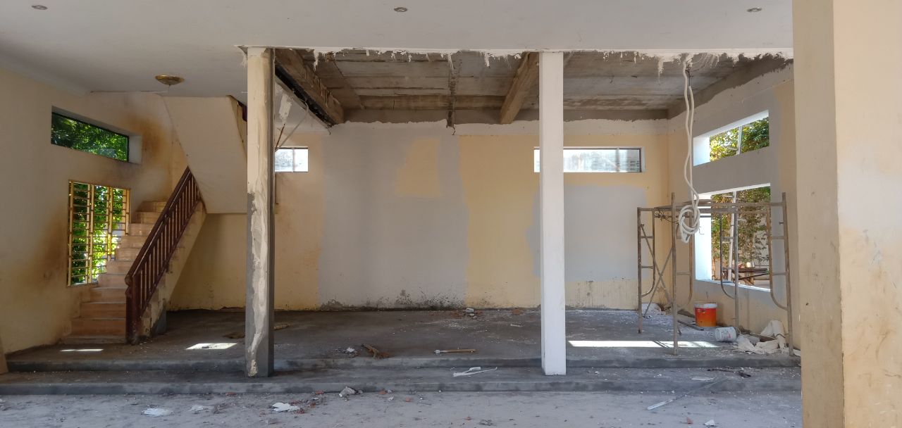 Community members working on the library construction